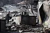 Wildfire victims and their families check the damage in a village in Andong, North Gyeongsang, on March 29. [YONHAP]