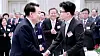 President Yoon Suk Yeol, left, shakes hands with People Power Party (PPP) interim leader Han Dong-hoon at a New Year’s event held at the Blue House state guest house in central Seoul on Jan. 3. [JOINT PRESS CORPS]