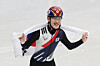 Rim Jong-un celebrates with the Korean national flag draped over his shoulders after securing the bronze medal in the men’s 1,000-meter short-track speed skating final at the 2026 Milan-Cortina Winter Olympics on Feb. 12. [KIM JONG-HO]