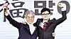 People Power Party (PPP) interim leader Han Dong-hoon, right, cheers with Kim Gyeong-ryul, a member of the PPP's emergency steering committee, at an event in Mapo District, western Seoul, on Wednesday. [NEWS1]