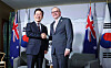 Korean President Lee Jae-myung, left, and Australian Prime Minister Anthony Albanese shake hands at their first bilateral meeting in Calgary, Canada, on June 16 on the margins of the G7 summit. [JOINT PRESS CORPS]