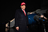 U.S. President Donald Trump speaks to press in the rain after landing on Air Force One at Joint Base Andrews in Maryland on May 30. [AFP/YONHAP]