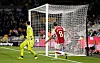 Arsenal's Martin Odegaard scores his side's second during a Premier League match against Wolverhampton Wanderers at the Molineux in Wolverhampton, England on April 20. [AP/YONHAP]