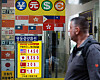 An exchange rate board is displayed at a currency exchange booth in central Seoul on Dec. 7. [NEWS1]