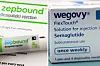 A combination image shows an injection pen of Zepbound, Eli Lilly and Company's weight loss drug, and boxes of Wegovy, made by Novo Nordisk. [REUTERS/YONHAP]