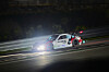 A race car speeds along the track during the Superrace Championship night race at Inje Speedium in Gangwon on Aug. 9. [SUPERRACE]