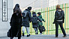 Parents see off their children at an elementary school in Seoul on Feb. 24. [NEWS1]