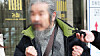 Convicted child rapist Cho Doo-soon answers questions from reporters after attending his first trial hearing at the Suwon District Court’s Ansan branch in Ansan, Gyeonggi, on March 11, 2024. [YONHAP]
