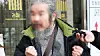Convicted child rapist Cho Doo-soon answers questions from reporters after attending his first trial hearing at the Suwon District Court’s Ansan branch in Ansan, Gyeonggi, on March 11, 2024. [YONHAP]
