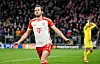 Bayern Munich's Harry Kane celebrates after scoring their first goal against Lazio at the Allianz Arena in Munich on Tuesday. [REUTERS/YONHAP]