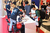 Fans receive autographs from PUBG Nations Cup players at the Grand Peace Hall at Kyung Hee University in Dongdaemun District, eastern Seoul, during a fan-signing event at Game Esports Seoul 2024 on Saturday. [KRAFTON]