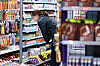 A person browses items at a convenience store in Seoul on April 14. [YONHAP]