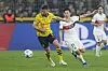 PSG's Lee Kang-in, right, in action with Dortmund's Salih Ozcan, during a UEFA Champions League Group F game at the Westfalen Stadium in Dortmund, Germany on Wednesday. [AFP/YONHAP]