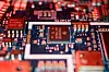 Semiconductor chips are seen on a circuit board of a computer in this illustration picture. [REUTERS/YONHAP]