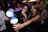 Olympic supporters take selfies with a lightstick made by HYBE on July 27, 2024, in Paris, France. [JOINT PRESS CORPS]