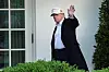 U.S. President Donald Trump walks down the colonnade to the Oval Office after arriving on Marine One at the White House in Washington on April 27. [REUTERS/YONHAP]