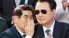 Former Defense Minister Kim Yong-hyun, left, whispers to President Yoon Suk Yeol during a military parade held in central Seoul in October. [JOINT PRESS CORPS]