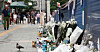 Flowers and messages are seen at the site of the Seoul City Hall crash that took place on July 1, 2024, on July 15, 2024. [NEWS1]