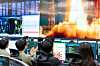 Researchers applaud the launch of the Arirang 7 multipurpose satellite at the Korea Aerospace Research Institute’s satellite control room in Daejeon on Dec. 2. [KOREA AEROSPACE RESEARCH INSTITUTE]