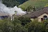 Firefighters work at the site of a plane crash in the Wood Ranch section of Simi Valley, California, on May 3. [AP/YONHAP]