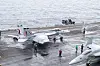A F/A-18 Super Hornet supersonic fighter jet is on the deck of the USS Theodore Roosevelt south of Jeju Island during the trilateral Freedom Edge exercise on Friday. [U.S. NAVY]