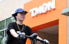 A pedestrian cycles by TMON's headquarters in Gangnam District, southern Seoul, on Tuesday. [NEWS1]