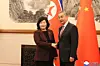 North Korean Foreign Minister Choe Son-hui, left, shakes hands with Chinese Foreign Minister Wang Yi as they meet for talks in Beijing on Sept. 28. [KCNA]