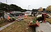 The fence and potted flowers in the water fountain square in front of the Blue House in Jongno District, central Seoul, were damaged after a teenager drove a car into them on Thursday. [YONHAP]