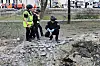 Police experts work on a crater at a children's railway near the central park of Kharkiv following an aerial attack, in Kharkiv on June 7, amid the Russian invasion in Ukraine. [AFP/YONHAP]