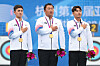 From left: Korea's Kim Je-deok, Oh Jin-hyek and Lee Woo-seok pose on the podium after taking gold in the men's team recurve archery event at the Hangzhou Asian Games in Hangzhou, China on Friday.  [NEWS1]