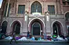 Migrants wake up at the campsite outside Sacred Heart Church in downtown El Paso, Texas on May 9, 2023. [AP/YONHAP]
