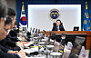 President Lee Jae Myung, right, speaks during a meeting with senior aides on structural reforms at the Yongsan presidential office in central Seoul on Nov. 13. [JOINT PRESS CORPS]