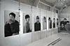 Framed BTS photos run along the walls in the pop-up store. [CHO YONG-JUN]