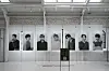 Each member has an individual canvas picture, with group pictures elsewhere in the store. [CHO YONG-JUN]