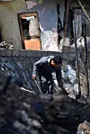 A man looks around his burned down house in Yeongdeok, North Gyeongsang, on March 30, after a wildfire swept through the area. [NEWS1]