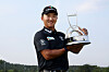 Kim Hong-taek poses with the Baeksang Holdings-Asiad CC Busan Open trophy in Busan on June 8. [KPGA]