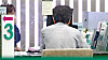 A customer consults with a bank teller in downtown Seoul on Aug. 8. [NEWS1]