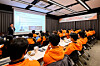 Koo Sang-jun, a developer and researcher at Hanwha Life’s AI division, gives a lecture to Vietnamese fintech students on the topic of Hanwha Life’s AI applications and service development cases in Korea in this undated photo provided by the company. [HANWHA LIFE]