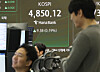A screen in Hana Bank's trading room in central Seoul shows the Kospi opening on Jan. 19. [YONHAP]
