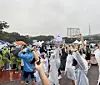 Runners stretch before the inaugural Disney Run Seoul 2025 marathon begins at the Yeouido Park in western Seoul on Oct. 11. [KIM JI-YE]