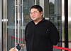 Lee Jun-hee, known by his YouTube channel name GooJeYeok, appears at the prosecutors' office as he heads to the Suwon District Court in Gyeonggi to attend an arrest warrant hearing on July 26, 2024. [NEWS1]