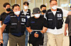 Kim Hyung-ryul, a drug kingpin arrested in Vietnam, is extradited through Terminal 2 of Incheon International Airport on July 19, 2022. [YONHAP]
