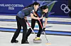 Seol Ye-eun and Kim Min-ji of South Korea sweep the ice during the women’s curling round-robin match against China at the 2026 Milan-Cortina Winter Olympics, held at the Cortina Curling Olympic Stadium in Cortina d’Ampezzo, Italy, on Feb. 16. [YONHAP]