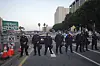 California Highway Patrol officers block a U.S. 101 freeway ramp during protests on Tuesday, June 10, 2025, in Los Angeles. [AP/YONHAP]