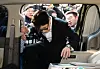 Former People Power Party leader Han Dong-hoon is seen getting into his car after leaving the National Assembly following a press conference on Jan. 14. [YONHAP]