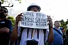A protester holds up message handwritten inside a Bible during a demonstration in response to a series of U.S. Immigration and Customs Enforcement (ICE) raids throughout the country, Tuesday, June 10, 2025, in Los Angeles. [AP/YONHAP]