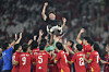 Vietnam head coach Kim Sang-sik of Korea celebrates with the Vietnam U-23 soccer team after defeating Indonesia during their final Asean U-23 Championship soccer match at Gelora Bung Karno Main Stadium in Jakarta, Indonesia on July 29, 2025. [AP/YONHAP]