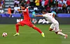 Seol Young-woo, left, tries to break through during a Group E match between Korea and Bahrain at the 2023 AFC Asian Cup at Jasim bin Hamad Stadium in Doha, Qatar on Jan. 15. [YONHAP]