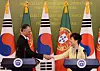 Portuguese President Anibal Cavaco Silva, left, shakes hands with Korea's President Park Geun-hye during their joint press conference in Korea on July 21, 2014. [JOINT PRESS CORPS]