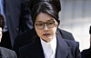 Former first lady Kim Keon Hee walks out of Seoul Central District Court in Seocho District, southern Seoul, after a questioning on Aug. 12. [JOINT PRESS CORPS]